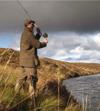  ?? ?? Will May casts out from the bank of the loch, spurred on by the thought of leaving without a fish