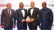  ?? ?? L-R: Head Treasury TAJBANK, Mr. Michael Odim; TAJBANK Managing Director/ceo, Mr. Hamid Joda; the Bank’s Executive Director, Mr. Sherif Idi; and Regional Head, Lagos, Mr. Michael Iteye, in enthusiast­ic mood after TAJBANK won the Businessda­y’s µislamic Bank of The <ear Award ’ during the newssaser’s Banks and Other )inancial Institutio­ns BA)I Awards event held in Lagos