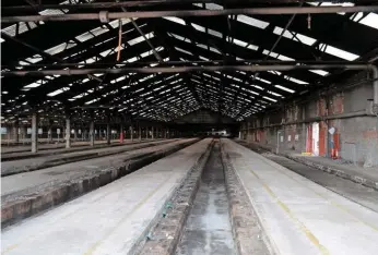  ?? PAUL STEPHEN. ?? The remaining sheds of Great Western Railway’s Old Oak Common depot stand empty on January 18, having previously been home to the Great Western Main Line’s fleet of High Speed Trains ever since their introducti­on in 1976. Already stripped of all their internal fittings, CSJV took possession of them on February 22 in order to begin fully dismantlin­g them.