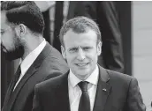  ??  ?? French President Emmanual Macron arrives at a primary school in Berd'huis, northweste­rn France,Thursday for a television interview in which he is expected to react to the ongoing strikes. AFP