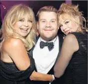  ?? Kevin Mazur Getty Images for amfAR ?? AMFAR GALA host James Corden is f lanked by Goldie Hawn, left, and Melanie Griffith.