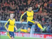  ??  ?? Arsenal's Chilean striker Alexis Sanchez celebrates scoring his team's first goal during the EPL football match against Middlesbro­ugh at Riverside Stadium in Middlesbro­ugh, northeast England.