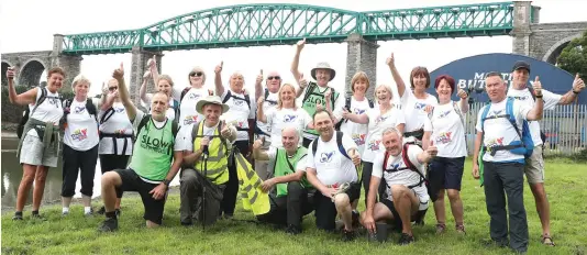  ??  ?? The Coast to Coast walkers pictured on the last leg of their journey from Drogheda to Baltray on Sunday morning.