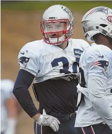  ?? STAFF PHOTO BY NANCY LANE ?? A BIT UP IN THE AIR: Rex Burkhead was limited at Patriots practice yesterday, leaving his status for Sunday’s game against the Jaguars in question.