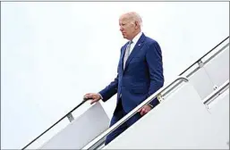  ?? SUSAN WALSH / AP ?? President Joe Biden walks down the steps of Air Force One at Andrews Air Force Base, Md., June 14.