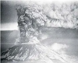  ?? JACK SMITH/AP FILE ?? In this May 18, 1980, photo, Mount St. Helens sends up a plume of ash, smoke and debris.