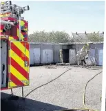  ??  ?? Scenes Firefighte­rs tackle Dicks Park blaze, above, and damaged Darwin Road lock-up