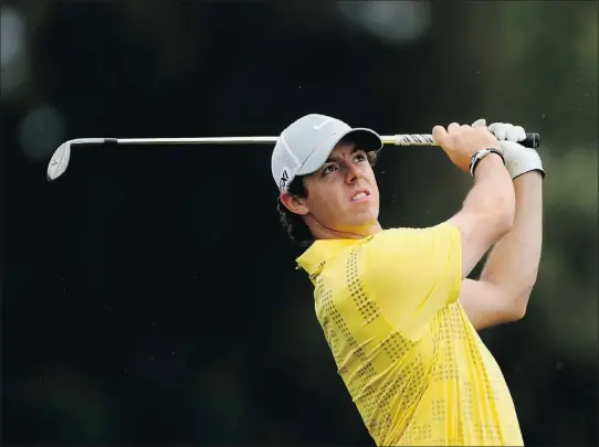  ?? — GETTY IMAGES ?? Rory McIlroy of Northern Ireland is looking for some redemption after walking off the course at the Honda Classic, a situation he says allowed him to release a lot of stress. He’ll also be seeking to find his lost swing at this week’s Cadillac...