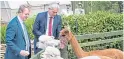  ?? Picture: PA. ?? Scottish Secretary Alister Jack, left, and Mr Barclay feed alpacas.