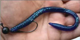  ??  ?? Mark Shatley and the author used junebug Zoom Trick Worms on ballhead jigs to catch all of their fish Monday at White Oak Lake State Park in Bluff City.
(Arkansas Democrat-Gazette/Bryan Hendricks)