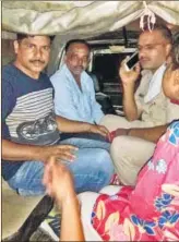  ??  ?? Kamal, 45, (in white shirt) after his arrest on Friday. Police said the former Uber cab driver allegedly used to terrorise his wife and children.(Right) The society from where Kamal was finally nabbed on Friday night.