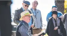  ?? Pictures: Kev Farmer. ?? Gerry McCann reads from Ulysses during the Bloomsday Celebratio­n at James Joyce Seat.