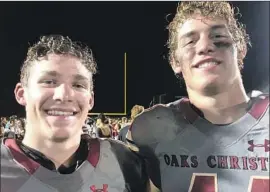  ?? Eric Sondheimer Los Angeles Times ?? TWINS Nate, left, and Jack Lenthall lead Oaks Christian’s defense. Last week, Nate returned an intercepti­on for a touchdown and Jack had five tackles.