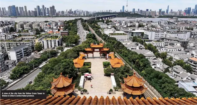  ??  ?? A view of the city from the Yellow Crane Tower in Wuhan in China’s central Hubei province.