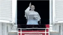  ?? ANDREW MEDICHINI/THE ASSOCIATED PRESS ?? Pope Francis delivers his blessing from his studio window overlookin­g St. Peter’s Square, at the Vatican, on Sunday.