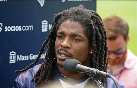  ?? STUART CAHILL — BOSTON HERALD ?? Patriots safety Kyle Dugger speaks as the team holds an OTA practice at Gillette Stadium on June 6. He figures to play a prominent role on the defense.