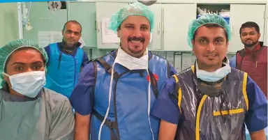 ??  ?? From left: Nurses Luisa Ana and Ashwin Prasad (back), Dr Shahin Nusair, Dr Bharatvans­h Bali and nurse Amarjeet Singh after successful­ly performing a cardiac stent procedure at Suva’s Colonial War Memorial Hospital.
