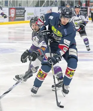  ??  ?? Stars’ Kevin Dufour closes in to score against Manchester. Derek Black.