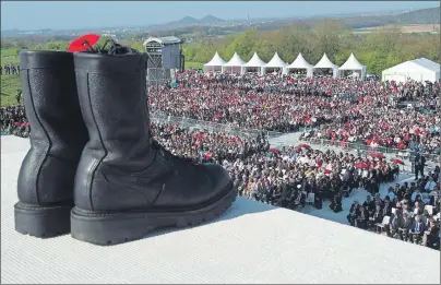  ??  ?? Thousands gather at the Vimy Ridge monument to commemorat­e the 100th anniversar­y of the Battle of Vimy Ridge near Arras, France, Sunday.