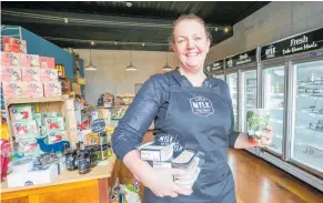  ??  ?? Kristy Isaacson, owner of MYLK Food Store, has soldher cafe in Hastings and is expanding her take homemeals. She is pictured in her Ahuriri MYLKFood Store.