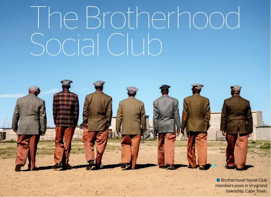  ??  ?? Brotherhoo­d Social Club members pose in Vrygrond township, Cape Town.