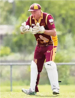  ?? Photograph­s by AMANDA EMARY. ?? Drouins wicketkeep­er Nick Harper juggles the ball after a rather fast ball.