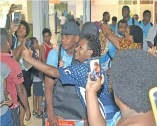  ?? Photo: Waisea Nasokia. ?? Fiji Airways 7s reps greeted by fans at the Nadi Internatio­nal Airport on February 5, 2018.