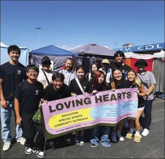  ?? Photo courtesy of Minah Kim ?? Loving Hearts members host a swap meet fundraiser in late August to raise money for homeless or otherwise disenfranc­hised William S. Hart Union High School District students.