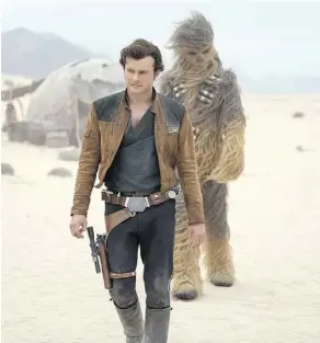  ??  ?? Alden Ehrenreich and Joonas Suotamo play the iconic duo Han and Chewie.