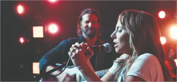  ?? WARNER BROS. ?? The music in the Academy Award-winning A Star Is Born, starring Bradley Cooper, left, and Lady Gaga, stirred something in Mike Boone when he watched the movie recently.