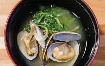  ??  ?? While you await a chance to experience chef Art Hayakawa’s artistry with sushi, you can enjoy the clam and miso soup at Sushi Hayakawa.