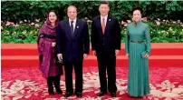  ?? — AFP ?? Nawaz Sharif and his wife Kalsoom Nawaz Sharif with Xi Jinping and his wife Peng Liyuan in Beijing.