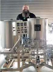  ?? ORCHESTRAT­ED MINDS BREWING ?? Head brewer Davy Martin has two years under his belt at Fort Lauderdale nanobrewer­y Orchestrat­ed Minds Brewing.