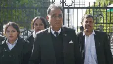  ?? — AFP ?? Akhtar Shah, the lawyer of Musharraf, leaves the special court after a court verdict in Islamabad on Tuesday.