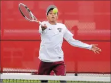  ?? GENE WALSH — DIGITAL FIRST MEDIA ?? Conestoga’s Kai Czubryt-Ogino returns a volley in a doubles match against Upper Dublin Monday.