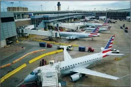  ?? SMILEY N. POOL/DALLAS MORNING NEWS ?? Nearly 4,500 pilots at American Airlines’ three major regional carriers will receive massive pay raises.
