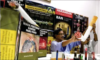  ??  ?? Mohideen (left) speaking during the press conference. — Bernama photo