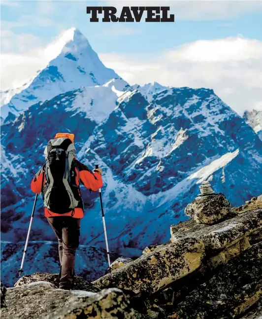  ?? GETTY IMAGES ?? Mountain hikers in the Himalayas are being welcomed back to Nepal under strict coronaviru­s safety precaution­s, in an effort to revive the nation’s tourism industry.