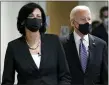  ?? AP FILE PHOTO ?? In this March 19 photo, Dr. Rochelle Walensky, director of the Centers for Disease Control and Prevention, leads President Joe Biden into the room for a briefing.