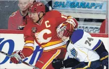  ?? CANADIAN PRESS FILE PHOTO ?? Jarome Iginla, left, is the Calgary Flames’ career leader in goals, game-winning goals, points and games played.