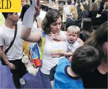  ?? CHIP SOMODEVILL­A/GETTY IMAGES ?? Representa­tives from faith and pro-immigratio­n groups walk out of a Senate Judiciary Committee hearing about the separation of children from their parents at the border on Capitol Hill Tuesday in Washington, D.C.