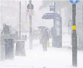  ??  ?? > High street sales were hit badly during the ‘Beast from the East’ snow