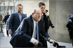  ?? JOHN MINCHILLO — THE ASSOCIATED PRESS ?? Harvey Weinstein arrives at a Manhattan courthouse before jury deliberati­ons in his rape trial last month.