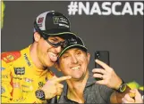  ?? Robert Laberge / Getty Images ?? Joey Logano, driver of the No. 22 Shell Pennzoil Ford, celebrates after winning the Monster Energy NASCAR Cup Series Championsh­ip Sunday in Homestead, Fla.