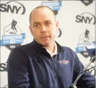  ?? Ned Gerard / Hearst Connecticu­t Media ?? UConn coach Mike Cavanaugh speaks at a press conference at Webster Bank Arena, in Bridgeport, in 2019.