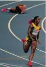  ?? ANTONIN THUILLIER/GETTY Image ?? Olympic champ Allyson Felix falls and Jamaica’s Shelly-Ann Fraser-Pryce races to a gold medal win in the women’s
200-metre final Friday.