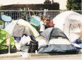  ?? Noah Berger / Special to The Chronicle ?? Tents line a sidewalk on McAllister Street in San Francisco on June 11. During the past month, the city has moved 388 tent dwellers from the area into hotels or to safe campsites.