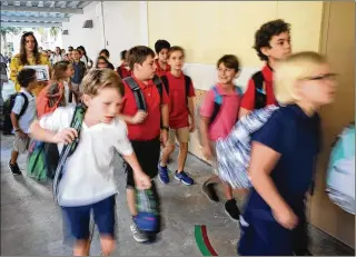  ?? MELANIE BELL / PALM BEACH DAILY NEWS ?? Despite yearslong trends to the contrary, high school and elementary school enrollment­s not only failed to grow this year, they went in the other direction, a school demographe­r says.