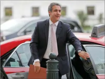  ?? PABLO MARTINEZ MONSIVAIS — THE ASSOCIATED PRESS FILE ?? Michael Cohen, President Donald Trump’s personal attorney, arrives on Capitol Hill in Washington. For more than a decade, Cohen has served as Trump’s private attorney and image protector. Now the FBI raids on Cohen’s office and hotel room to seize...