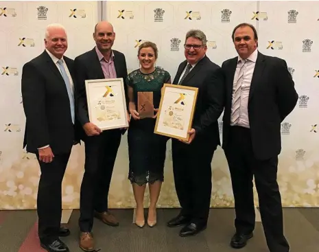  ?? PHOTO: CONTRIBUTE­D ?? PREMIER'S AWARDS: The AGT Foods Australia executive team (from left) Darren Wyper, Ben Wigzell, Hannah Castle, Peter Wilson and Michael Brittain.